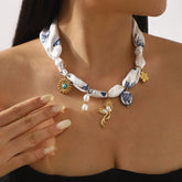 Collier ruban à pendentif fleur en céramique