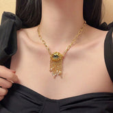 Parure œil du démon et perles – style chic et original