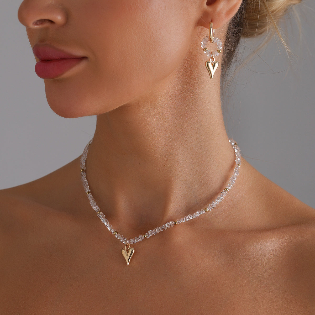 Parure cœur en cristal – collier et boucles d’oreilles au style chic et moderne