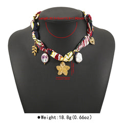 Collier ruban à pendentif fleur en céramique