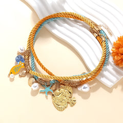 Collier multi-couches océan – Poisson, étoile de mer et coquillage