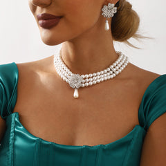 Parure fleur et perles