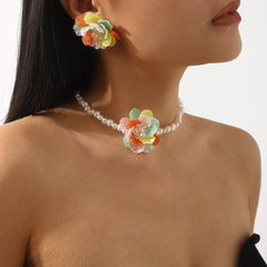 Boucles d’oreilles camélia perlé