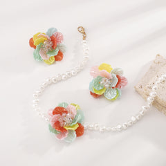 Boucles d’oreilles camélia perlé