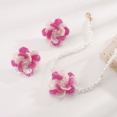 Boucles d’oreilles camélia perlé