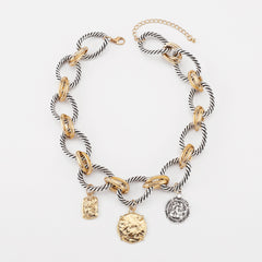 Collier pièce vintage torsadé