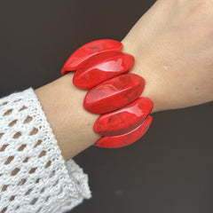 Bracelet rouge Angola – style tendance et géométrique