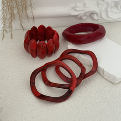 Bracelet rouge Angola – style tendance et géométrique