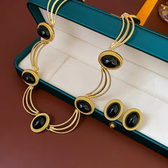 Boucle d’oreille femme Vintage – Métal noir ovale, style rétro, argenté