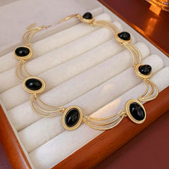 Collier femme Vintage – Métal noir ovale, style rétro, argenté