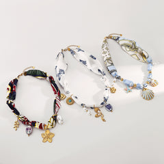 Collier ruban à pendentif fleur en céramique