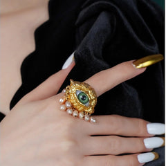 Parure œil du démon et perles – style chic et original